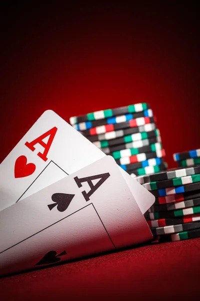 Multi-camera live dealer broadcast showing card table and dealer interaction
